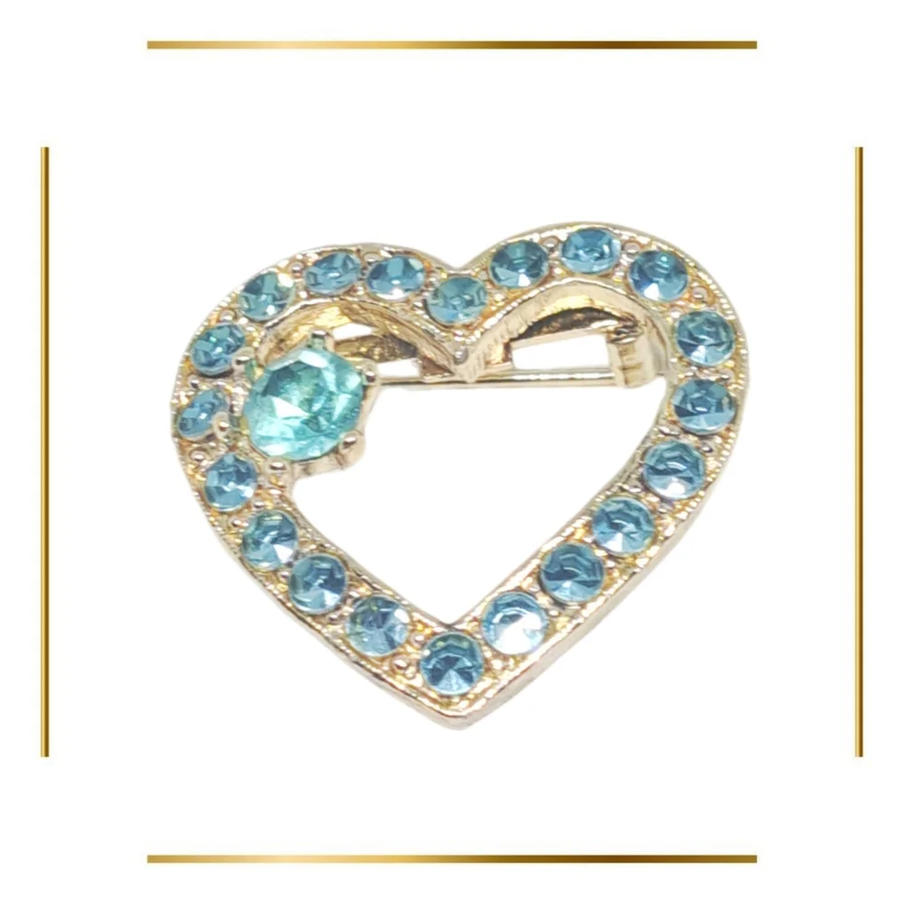 Gold Tone Heart Shaped Brooch with Blue Rhinestones